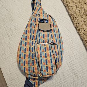 Kavu Multicolor Geometric Sling Backpack - Blue, Orange, Yellow